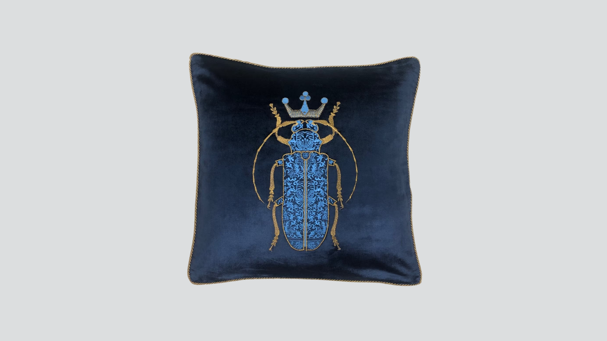 Cushion cover - hand embroidered - blue w/ blue bug