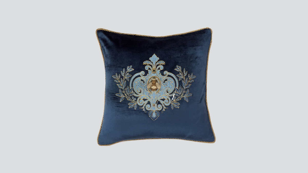 Cushion cover - hand embroidered - teal w/ blue wreath